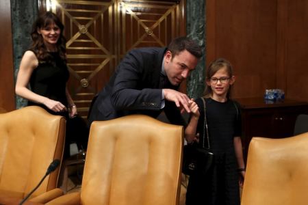 Actor Ben Affleck, actress Jennifer Garner and their daughter Violet Affleck leave after a Senate Appropriations State, Foreign Operations and Related Programs Subcommittee hearing on "Diplomacy, Development, and National Security" on Capitol Hill in Washington March 26, 2015.