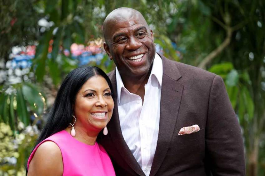 Former NBA basketball player Earvin Magic Johnson (R) and his wife, Cookie Johnson, pose at the premiere of the movie "The Legend of Tarzan" in Hollywood, California, June 27, 2016.
