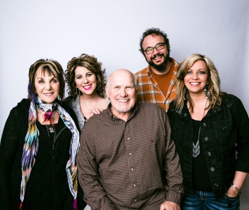 The Isaacs are pictured with NFL Hall-Of-Fame player Terry Bradshaw who executive produced the album 