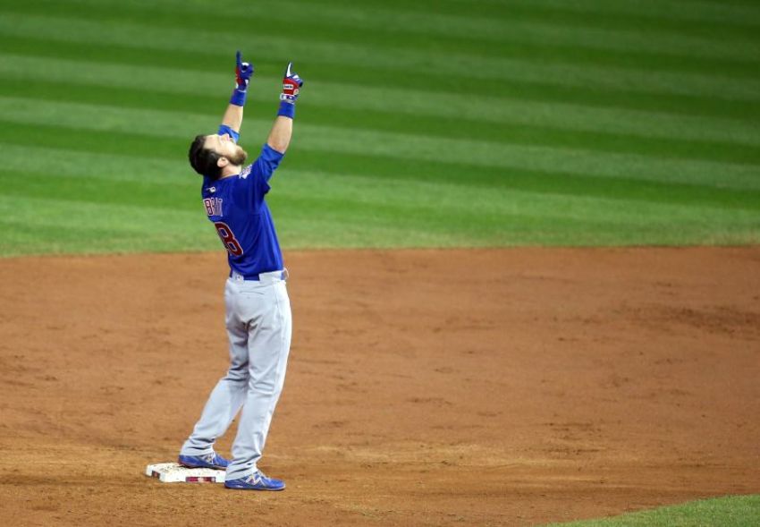 Chicago Cubs outfielder Ben Zobrist celebrates after hitting a RBI double against the Cleveland Indians in the 10th inning in game seven of the 2016 World Series at Progressive Field in Cleveland, Ohio, on November 3, 2016.