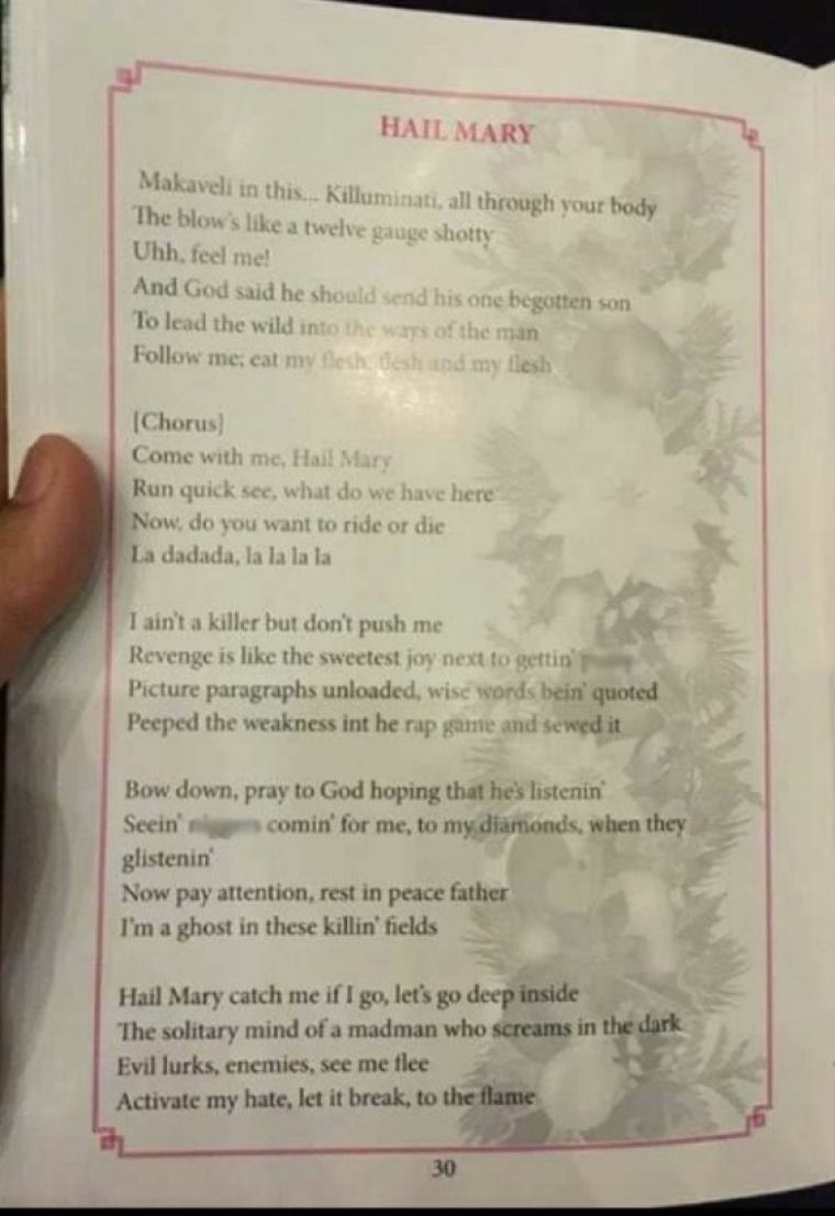 Tupac lyrics on Christmas carols sheet