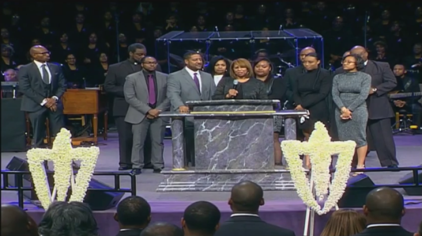 The family of the late Bishop Eddie Long of New Birth Missionary Baptist Church in Lithonia, Georgia listen with the congregation as his wife, Vanessa (podium) speaks at his funeral on Wednesday January 25, 2017.