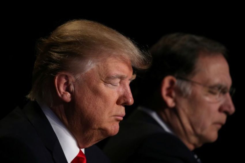 President Donald Trump prays during the National Prayer Breakfast event in Washington, D.C., on Feb. 2, 2017.