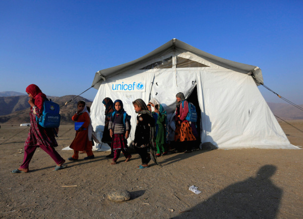 Afghan refugee children leave a class at a refugee camp on the outskirts of Jalalabad, Afghanistan, February 12, 2017.