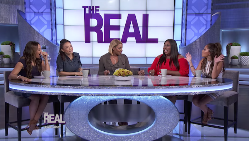 Adrienne Houghton (right) and her co-hosts talk on "The Real," Feb. 23, 2017.