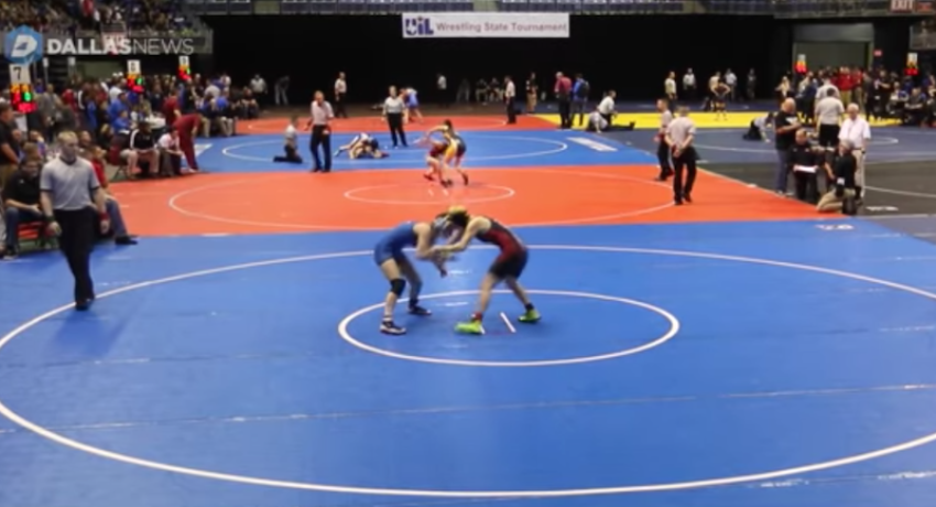 Mack Beggs (right) wrestles at the UIL Wrestling State Tournament in Texas, February 2017.