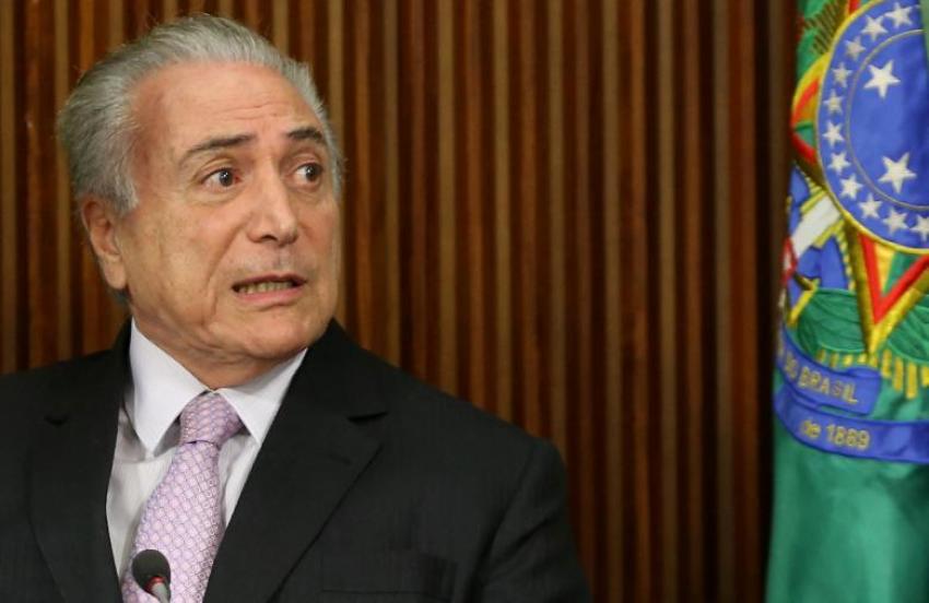 Brazil's President Michel Temer reacts during a meeting with political leaders at Planalto Palace in Brasilia, Brazil, December 5, 2016.
