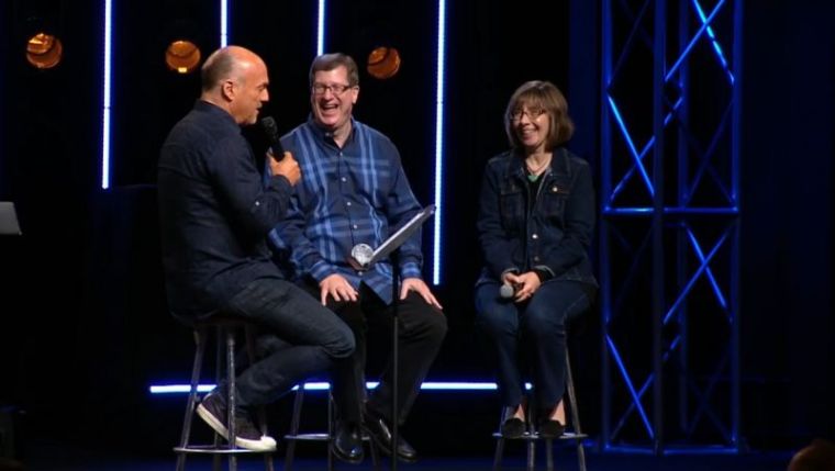 Greg Laurie (L) interviewing Lee Strobel (C) and Leslie Strobel (R)
