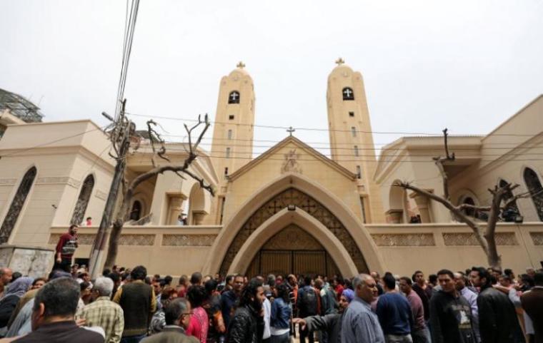 Egyptians gather in front of a Coptic church that was bombed on Sunday in Tanta, Egypt, April 9, 2017.