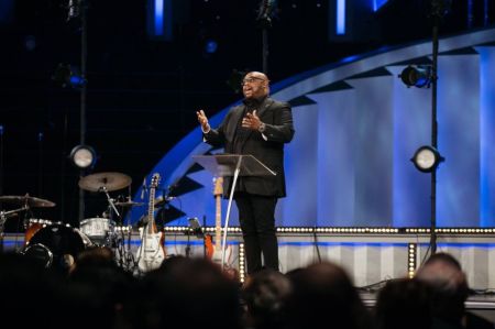 Pastor John Gray addresses the congregation at Lakewood Church.
