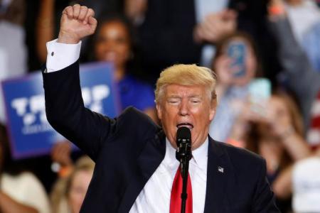U.S. President Donald Trump appears on stage at a rally in Harrisburg, Pennsylvania, U.S. April 29, 2017.