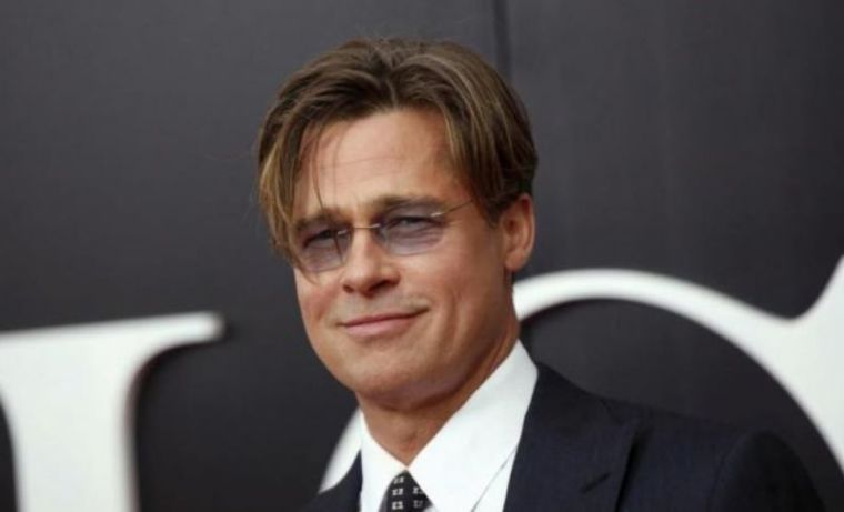 A photo of Brad Pitt posing on the red carpet at the premiere of 'The Big Short' in New York in November 2015.