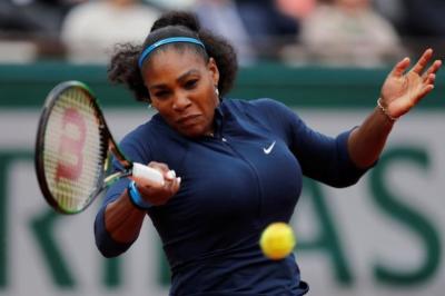 Serena Williams playing against Garbine Muguruza of Spain at the French Open Women's on April 6, 2016.