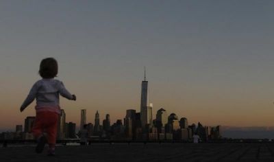 Girl in front of New York skyline