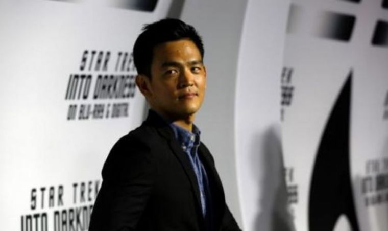 John Cho poses at the party for the release of the Blu-Ray DVD of 'Star Trek Into Darkness' in California.