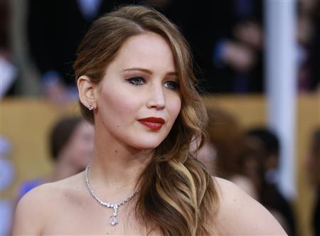 Actress Jennifer Lawrence, from the film "Silver Linings Playbook," arrives at the 19th annual Screen Actors Guild Awards in Los Angeles, California January 27, 2013.