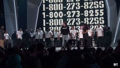 Logic and Khalid perform "1-800-273-8255" at the MTV Video Music Awards on August 27, 2017.