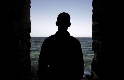 A man is silhouetted in the