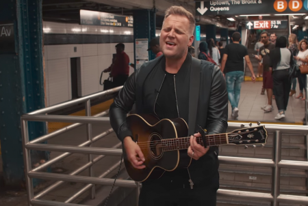 Matthew West performs his song "Something Greater" in a New York City subway station, Oct 12, 2017.