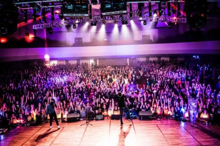 Children attend a youth ministry event hosted by the national organization Christ in Youth.