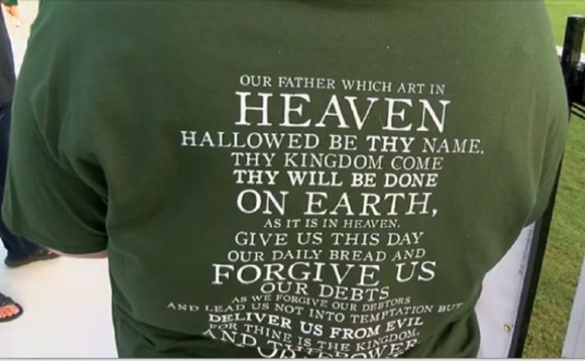 An attendee of a football game at Locust Fork High School in Locust Fork, Alabama, wears a "We Believe" T-shirt on Sept. 21, 2018.