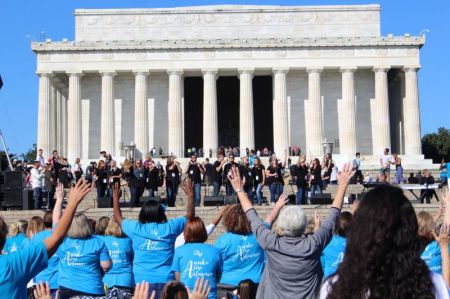 Hundreds of worshipers praise God at
