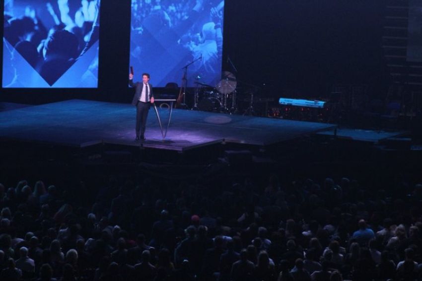 Thousands listen to Joel Osteen preach during one of his "Night of Hope" events at Capitol One Arena in Washington, D.C. on Oct. 6, 2018.