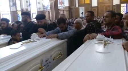 Coptic Christians mourn the death of seven believers during a funeral in Egypt on November 3, 2018.