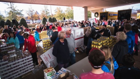 Volunteers gather the supplies needed for the Blessing Baskets compiled by volunteers at Cross Church, a multi-site megachurch based in Arkansas.