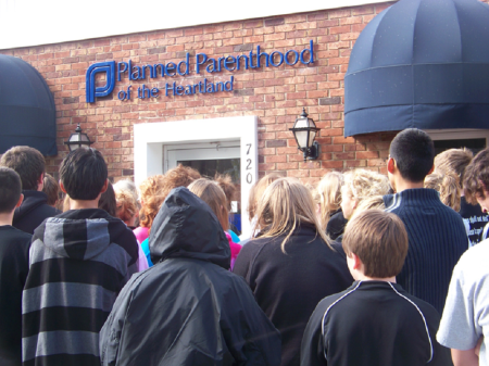 Demonstrators participate in a 40 Days for Life prayer campaign outside of a Planned Parenthood clinic in Storm Lake, Iowa in 2011.