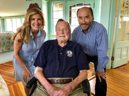 Kim Greenwood, former President George H.W. Bush, and Lee Greenwood.