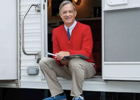 Tom Hanks dressed as Mr. Rogers on the set of "A Beautiful Day in the Neighborhood.”