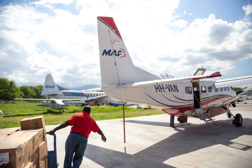 Supplies being loaded into a Cessna 208B Grand Caravan at the Port-au-Prince airport in Haiti.