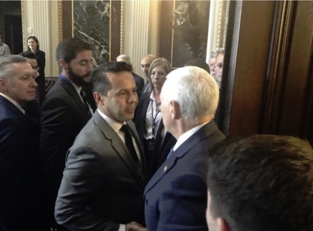 Vice President Mike Pence (R) shakes hands with Rev. Samuel Rodriguez (L) at the fifth-annual Justice Summit organized by the National Hispanic Christian Leadership Conference at the Museum of the Bible in Washington, D.C. on March 14, 2019.