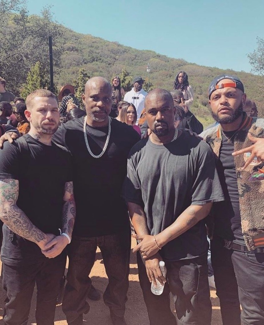 DMX (2nd L) poses with Kanye West and others at West's