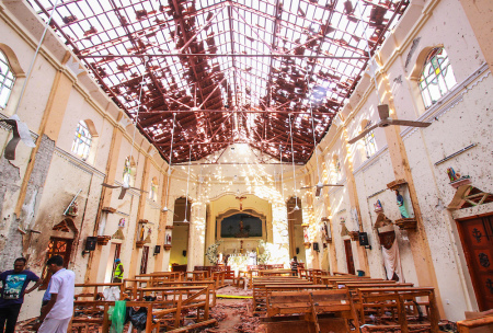 Sri Lankan officials inspect St. Sebastian's Church in Negombo, north of Colombo, after multiple explosions targeting churches and hotels across Sri Lanka on April 21, 2019, in Negombo, Sri Lanka.