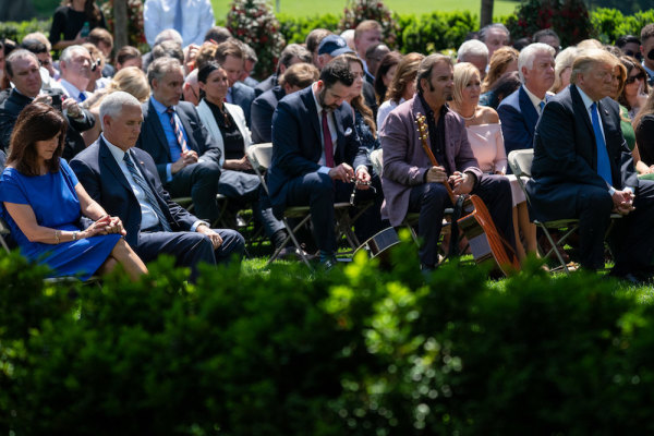 President Donald J. Trump, First Lady Melania Trump, Vice President Mike Pence and Second Lady Karen Pence bow their heads in prayer during the National Day of Prayer service May 2, 2019, in the Rose Garden of the White House.