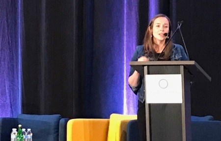 Apologist Jo Vitale addresses a session on