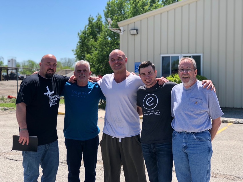Volunteers from Emmanuel Church pose for a photograph outside Johnson County Community Corrections center in Johnson County, Illinois.