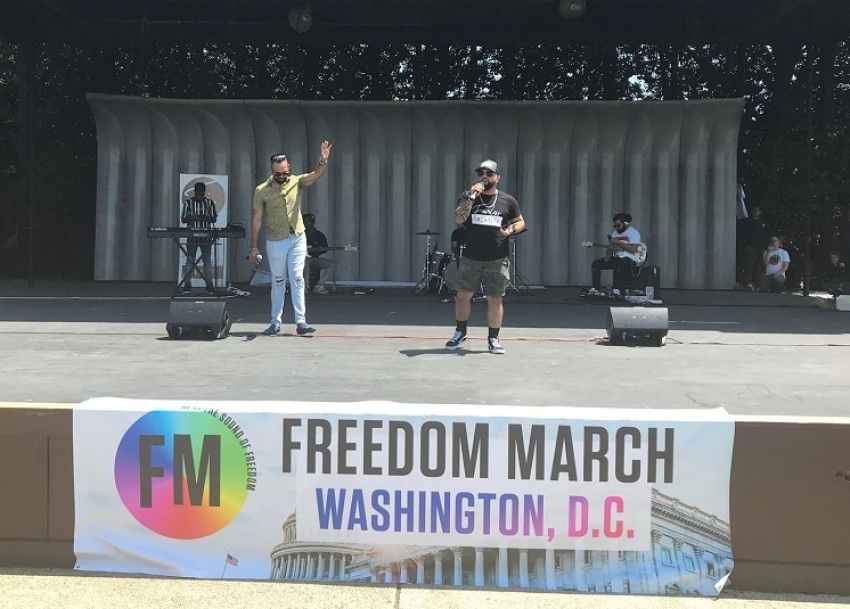 Pulse nightclub shooting survivors Angel Colon (L) and Luiz Javier Ruiz (R) speak at the Freedom March at the Sylvan Theater in Washington, D.C. on May 25, 2019.