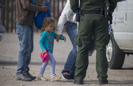 A young child is seen as she along with other migrants are processed by Border Patrol agents after being detained when they crossed illegally into the United States from Mexico on June 02, 2019 in Sunland Park, New Mexico.