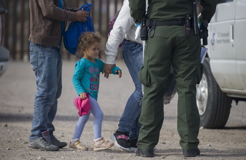 A young child is seen as she along with other migrants are processed by Border Patrol agents after being detained when they crossed illegally into the United States from Mexico on June 02, 2019 in Sunland Park, New Mexico.