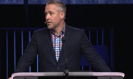 Southern Baptist Convention President J.D. Greear giving remarks at the SBC Annual Meeting in Birmingham, Alabama on Tuesday, June 11, 2019.