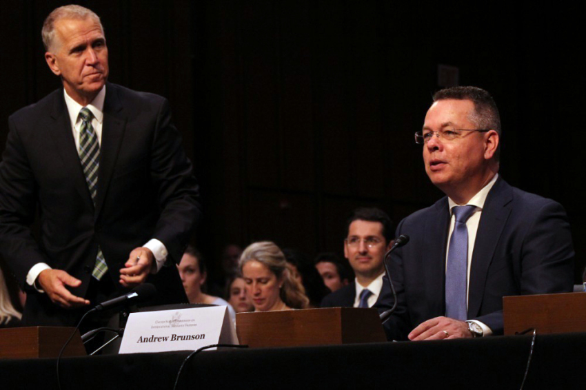 Andrew Brunson speaks at a U.S. Commission on International Religious Freedom hearing on religious freedom issues in Turkey at the Hart Senate Office Building in Washington, D.C. on June 27, 2019. Standing behind him is Republican North Carolina Sen. Thom Tillis.