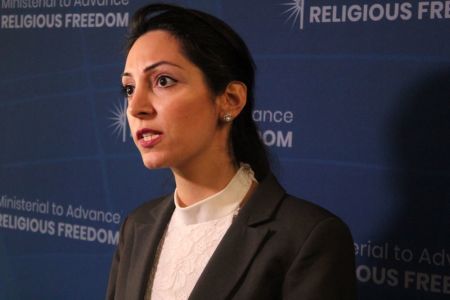 Dabrina Bet Tamraz, an Assyrian Christian from Iran, speaks with the press at the U.S. State Department Ministerial to Advance Religious Freedom at the Harry S. Truman Building on July 17, 2019.