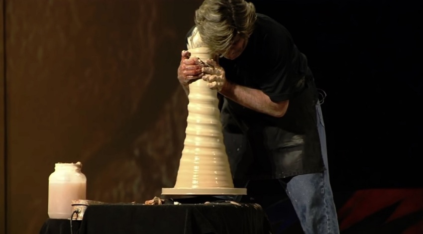 Mike Rozell, co-founder of Potter's Field Ministries, conducts a pottery demonstration at Rock Church in San Diego, California, in 2012.