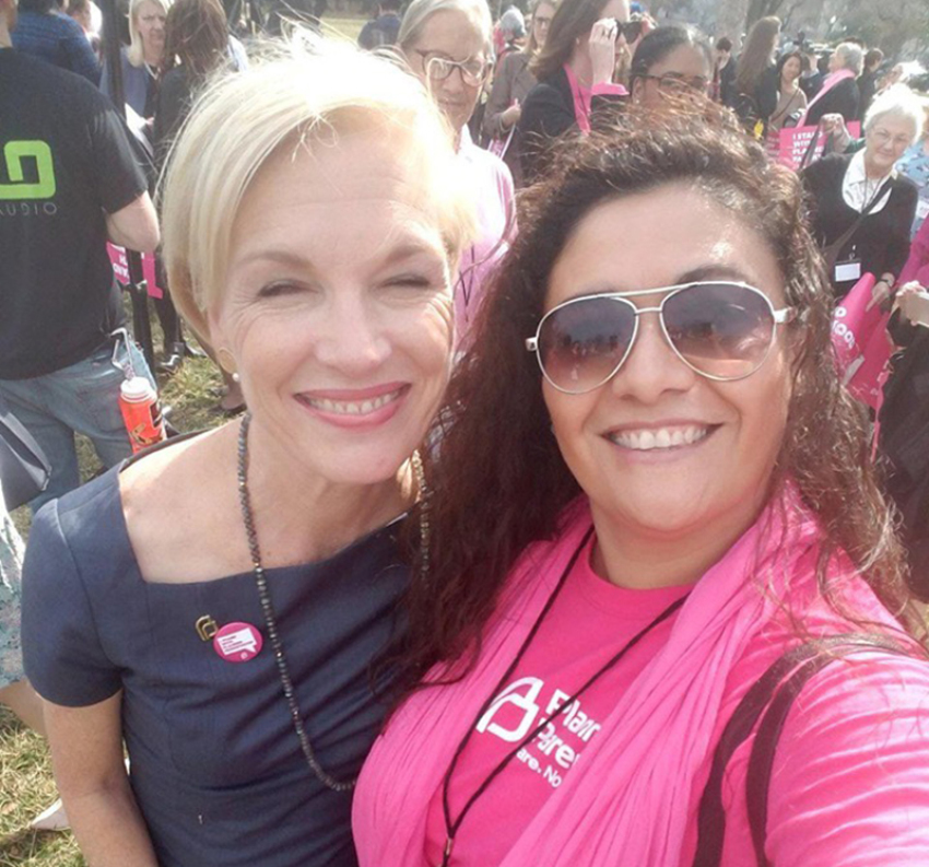 Mayra Rodriguez standing next to former Planned Parenthood President Cecile Richards in March 2017.