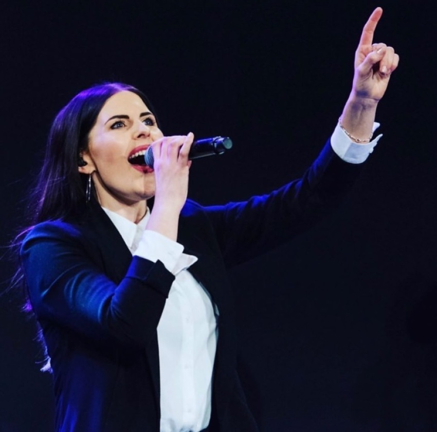 Chelsea Taylor, worship leader at the Hills campus of Hillsong Worship in Sydney, Australia, leading worship in August 2019.