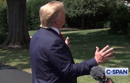 President Donald Trump says "I am the chosen one," in remarks before boarding Air Force One on the White House lawn, August 21, 2019.