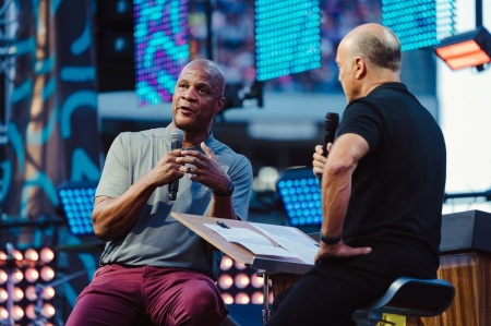 Former MLB all-star Darryl Strawberry talks with evangelist Greg Laurie during the 2019 Southern California Harvest Crusade on Aug. 25, 2019 in Anaheim, California.